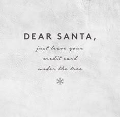 a white wall with the words dear santa, and an image of a snowflake