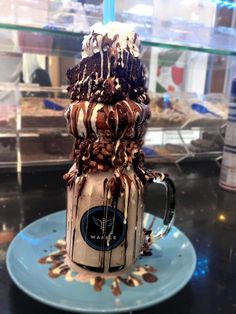 a chocolate mug cake sitting on top of a blue plate