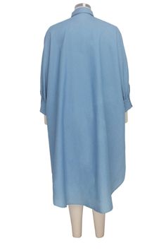 Expertly crafted with an oversized fit and button down design, this Denim Cape Blouse offers a modern and chic take on the classic denim shirt. With sizes ranging from S to 2XL, this versatile piece is perfect for all body types and can easily be dressed up or down for any occasion. Add a touch of effortless style to your wardrobe today. Material Cotton , Polyester Neckline Turn-down Collar Pattern Type Solid Sleeve Length Full Season Summer DRESS/TOP/BOTTOM SIZE CHART Most products have a lot o Oversized Solid Color Shirt Dress For Spring, Spring Oversized Solid Color Shirt Dress, Oversized Plain Blouse For Spring, Oversized Cotton Shirt Dress, Blue Button-up Denim Top With Button Cuffs, Blue Denim Button-up Top With Button Cuffs, Oversized Solid Shirt Dress For Fall, Oversized Collared Blue Denim Top, Oversized Blue Denim Collared Top