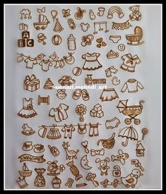 a bunch of different types of stickers on a white sheet with gold foiling