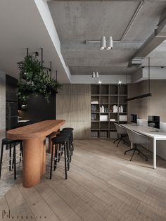 an office with wooden floors and black chairs