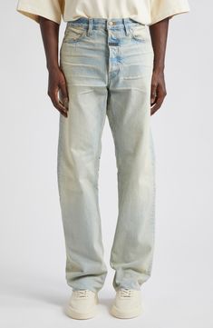 From the label's 8th collection come these American-made straight-leg jeans crafted from nonstretch Japanese denim and ending with unfinished hems. 33" inseam; 16 1/2" leg opening; 11" front rise; 15" back rise (size 32) Button fly Five-pocket style 100% cotton Dry clean Made in the USA Designer Clothing Black Owned/Founded Designer Straight Leg Jeans For Streetwear, Designer Streetwear Bottoms With Five Pockets, Designer Denim Straight Leg Pants, Designer Straight Leg Denim Pants, Jean Crafts, Clothing Black, Japanese Denim, Fear Of God, Washed Jeans