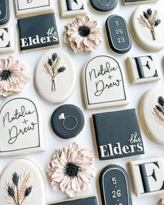 decorated cookies with names and flowers on them