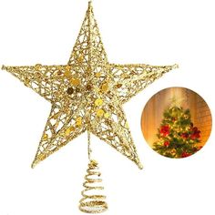 a christmas tree topper with a gold star ornament hanging from it's side