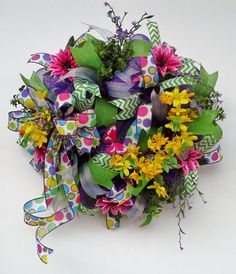 a bouquet of colorful flowers on a white background