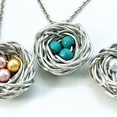 "This Bird's Nest necklace is beautiful way to express love of family. You design the necklace. Select birthstone colors as seen in the 2nd to last picture. THIS WILL NOT TARNISH Each necklace is made to order by me in my workshop. Only offered in silver tone. ☆HOW TO ORDER 1. Select Size from dropdown 2. Select Style from dropdown 3. Under Personalization, tell me the color(s) beads you want; for example: 1 Jan, 2 Oct, or maybe you like the Robins Egg Bead, so just say \"robins egg\" (Please be Handmade Necklaces For Mother's Day Crafting, Silver Round Bead Necklaces For Mother's Day, Silver Round Beads Necklace For Mother's Day, Birds Nest Necklace, Love Of Family, Mother's Day Jewelry, Express Love, Steel Stamp, Plastic Envelopes