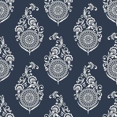 a blue and white wallpaper with an ornate design