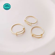 ❥Material: Base metal: Brass Real 14K Gold plated Brass,with Color protecting Layer. ➤Lead & Nickel Free ❥Kindly Note:Not easy to get tarnished under proper care. ❥Size:the Wire Thicknedd:1.0mm ❥ Shipping ➤We ship from China. ➤Usually It will take 2-3 Weeks to US ➤Usually It will take 2-4 Weeks to other countries Adjustable Gold Metal Rings, Adjustable Gold Midi Rings For Everyday, Adjustable Metal Midi Rings For Gifts, Adjustable Metal Midi Rings Gift, Adjustable Metal Midi Rings As Gift, Adjustable Minimalist Gold Ring, Adjustable 14k Gold Midi Rings, Adjustable Nickel-free Yellow Gold Ring, Gold Adjustable Minimalist Stackable Rings