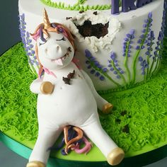 there is a cake with a unicorn on it