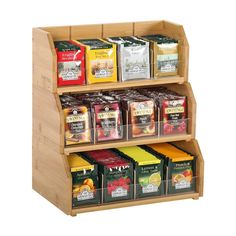 a wooden shelf filled with lots of tea bags