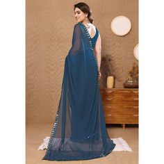 Teal Blue colored saree is prettified with beautiful embroidered butti work as shown which makes it appear classy. This saree is made of georgette fabric which is accompanied with banglori silk blouse piece which you can customise as per your design/style. Women can buy this saree to wear for their party and functions. Note:- The actual product may differ slightly in color and design from the one illustrated in the images when compared with computer or mobile screen Measurements: Saree : Georget Mobile Screen, Georgette Saree, Georgette Fabric, Georgette Sarees, Style Women, Blouse Piece, Design Style, Silk Blouse, Teal Blue