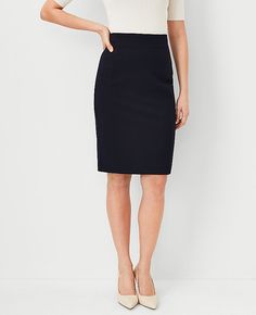 Elevate your wardrobe with the Ann Taylor Seamed Pencil Skirt in Seasonless Stretch, tailored specifically for a curvy fit. This skirt is a testament to timeless style and comfort, designed to flatter your silhouette while providing flexibility and support.

- **Size:** 8
- **Fit:** Curvy, tailored fit
- **Length:** 24 inches long; hits below the knee
- **Color:** Deep Navy Sky
- **Material:** Shell: 68% Polyester, 29% Viscose, 3% Spandex; Lining: 100% Polyester
- **Closure:** Hidden back zipper Flattering Fitted Pencil Skirt For Workwear, Classic Fitted Pencil Skirt, Classic Fitted Elastane Pencil Skirt, Workwear Stretch Skirt With Side Zipper, Workwear Skirt With Side Zipper And Stretch, Stretch Skirt With Side Zipper For Work, Versatile Workwear Pencil Skirt, Fitted Lined Pencil Skirt For Business Casual, Fitted Workwear Skirt With Side Zipper