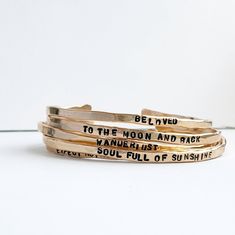 Sometimes it's hard to find just the right words. Our Noteworthy Bangles make it easy to send the perfect sentiment. One of our most popular gift giving pieces! Noteworthy Bangles are subtle and thoughtful & can be worn everyday. All uppercase letters 6 1/2 inch bracelet with 1 inch opening, squeeze to open or close One size fits most If you would like to write your own message, please choose the Personalized Caroline Bangle here. - Please message us at hello@sarahcornwelljewelry.com if you need Ideas Jewelry, Step Daughter, Party Inspo, Bangles Making, Pretty Jewelry, Gold Gift, Uppercase Letters, Jewel Box, Pearl Gemstone