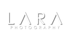 the word larra photography written in white letters on a white background with black and grey lines