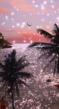 the sky is filled with stars and sparkles as people stand in the water near palm trees