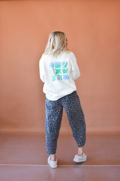 This cream-colored crewneck sweatshirt is both cozy and easy to layer. With a floral design on the back and a playful mantra on the front left pocket that reads "I hope something good happens to you," this sweatshirt is sure to bring some positivity to your wardrobe. Product Details: measurements: BUST: small 24" medium 24.5" large 25" 100% cotton long sleeves crewneck sweatshirt relaxed fit size up for length model wearing size large model stats: size 4, 5'5 Skort Outfit, Nickel And Suede, Fall Collections, Fall Trends, Bottoms Pants, Outfit Sets, Denim Dress, Sweater Top, Jumpsuit Romper