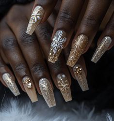 A pair of elegantly manicured hands with long, almond-shaped nails featuring festive holiday nail art. The nails are decorated in shades of deep red, gold, and white, with intricate designs including snowflakes, sparkles, and candy cane stripes. The background is softly blurred, enhancing the focus on the nails and giving a warm, cozy holiday ambiance. Crazy New Years Nails, New Year Fireworks Nails, Christmas Nails Gold And Green, Christmas Nails Silver And Gold, Gold Christmas Nails Acrylic, New Years Nail Designs Glitter, White And Gold Christmas Nails, Silver Holiday Nails, Sparkly Holiday Nails