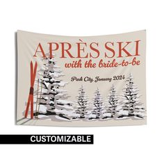 a tapestry hanging on the side of a wall with skis and snow covered trees