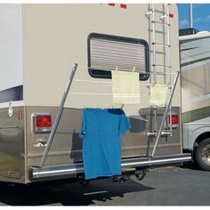 an rv with clothes hanging out to dry