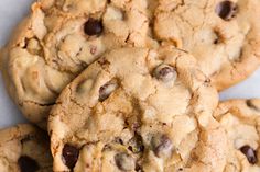 a pile of chocolate chip cookies sitting on top of each other