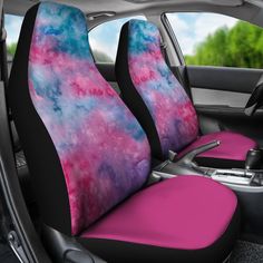 two pink and blue seat covers in the back of a car