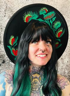 Welcome to Witchwood's brand new XL wide brim hats! These hats have our biggest brim yet! They are made of sturdy vegan felt and are all hand printed. Vegan Felt Size: 23" (but size is adjustable and can be sized down, inside the hat) PLEASE NOTE: These hats have a bit more "give" to the circumference and can fit a slightly bigger size than our other wide brim hats Brim - 3.75" wide Hat Color - Black Print Color - Green, Light Green & Red Wide Brim Hat Outfit, Brim Hat Outfit, Witch Costume Diy, White Fedora Hat, Goth Witch, Felt Cowboy Hats, Bride Hat, Floppy Sun Hats, Painted Hats