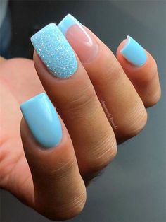 Sep 14, 2020 - Here we have light blue coffin shape nails. Some are simply sparkly blue, one feature a popular French design and there is one glitter powder nails, too. The French design is nude base with light blue tips. We think this nails design are awesome and it can make you looks pretty and trendy edge, too. Blue Gel Nails, Blue Glitter Nails, Baby Blue Nails, Blue Acrylic Nails, French Tip Acrylic Nails, Blue French, Cute Gel Nails, Blue Nail, Dipped Nails