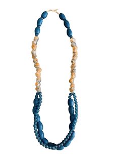 Handcrafted and inspired by local artisans in the Krobo mountains of Ghana, the Agudie Necklace is a statement piece perfect for any occasion. Made from unique powdered glass beads, fired in kilns for durability, and featuring both Krobo and Ashanti beads, this necklace makes for a stunning addition to your jewelry collection. Blue Multi-strand Wooden Bead Necklaces, Elegant Blue Jewelry With Wooden Beads, Artisan Blue Wooden Beads, Artisan Blue Beaded Necklace With Natural Stones, Blue Artisan Necklace With Large Beads, Artisan Blue Necklace With Large Beads, Adjustable Blue Necklace With Wooden Beads, Blue Hand-strung Long Necklace, Blue Long Hand-strung Necklace