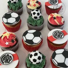 cupcakes decorated with soccer balls and grass for an arp team party on cake central