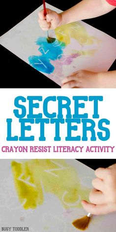 two children's hands painting letters on paper with the words secret letters and crayon