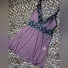 Lilac With Black & Silver Detailing, Sheer Paneling, Nightie/Shortie In Women's Size Small Or 4/6. In Excellent, Unworn Condition. Unknown Designer. Fitted Purple Sleepwear With Built-in Bra, Purple Sleepwear With Built-in Bra For Night, Fitted Purple Sleep Top, Purple V-neck Sleepwear, Purple V-neck Sleepwear For Bedtime, Fitted Purple Sleepwear For Pajama Party, Purple Camisole Sleepwear For Loungewear, Purple Camisole Sleepwear For Bedtime, Fitted Purple Camisole Sleepwear