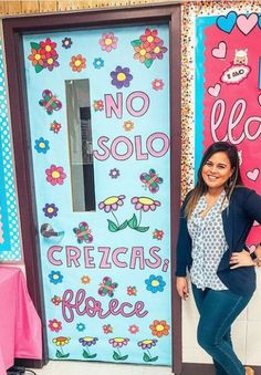 a woman standing in front of a door with no soloo written on the side