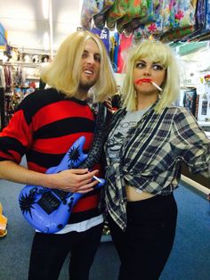 a man and woman are standing in a store