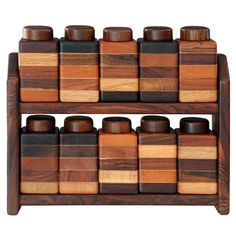 a wooden shelf with many different types of bottles on it's sides and the top half is made out of wood