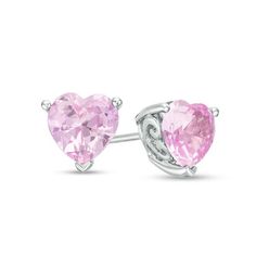 Perfectly petite, these heart stud earrings are a charming look she’ll want to wear day after day. Crafted in sterling silver, each adorable earring showcases a 6.0mm heart-shaped lab-created bright pink sapphire solitaire atop a sculpted scrollwork setting with heart-shaped details. Buffed to a brilliant luster, these post earrings secure comfortably with friction backs. Pink Heart Earrings, Sapphire Solitaire, Peoples Jewellers, Heart Stud Earrings, Heart Studs, Stone Heart, Heart Earrings Studs, Yellow Diamond, Sterling Silver Heart