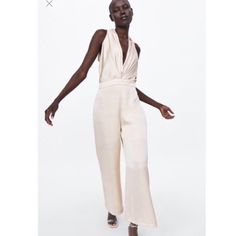 Size Medium Has Tag Xs Doesn’t But It’s New V-Neck Wide Leg Back Hidden In-Seam Zipper Closure Zara Sleeveless Jumpsuits For Date Night, Sleeveless Beige Jumpsuit For Night Out, Beige V-neck Jumpsuits And Rompers For Night Out, Chic Zara V-neck Jumpsuits And Rompers, Jumpsuit Mango, Pleated Jumpsuit, Crochet Romper, Satin Jumpsuit, Zara Jumpsuit