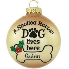 a glass ornament with an image of a dog's paw on it