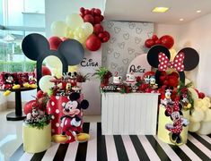 mickey mouse birthday party with balloons and decorations