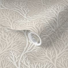 a wallpaper with white branches on it and a light grey background that is very soft