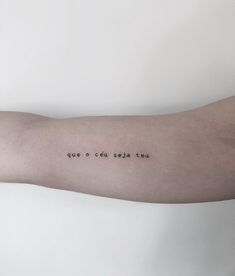 a person's arm with writing on it