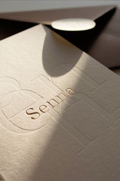 an open book with the word sema on it sitting on top of a table