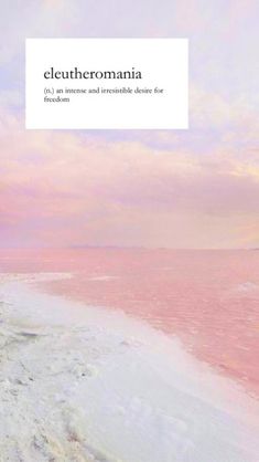 an image of the beach with pink water and clouds in the background, including text that reads