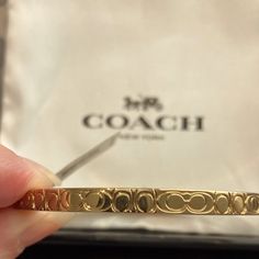 Fashion Bangle 3/8” Thick 2.5” Wrist Opening Debossed C Pattern Coach Bangle, Coach Bracelets, Gold Bracelet Stack, Gold Bracelets Stacked, Coach Jewelry, Princess Jewelry, Jewelry Staples, Jewelry Essentials