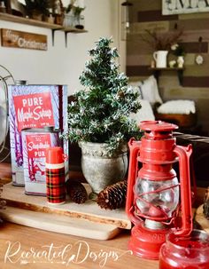 a christmas tree and other holiday decorations on a table