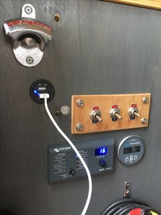 the control panel is connected to an electrical outlet and plugged in with other wires