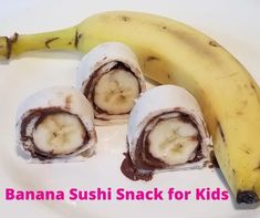 there is a banana sushi snack for kids on the plate