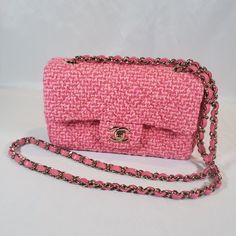 Elevate Your Style With This Beautiful Chanel Mini Classic Handbag In Fuchsia. The Bag Is Adorned With A Woven Tweed Wool Exterior In A Lovely Pink Hue That Is Perfect For Adding A Pop Of Color To Any Outfit. The Gold Hardware And Crossbody Strap Add A Touch Of Elegance To The Bag, Making It Perfect For Any Occasion. The Bag Has A Turn Lock Closure That Ensures Your Belongings Are Safe And Secure. The Bag Is Small In Size, Measuring 7.8" In Width, 4.7" In Height, And 2.3" In Depth, With A Strap Drop Of 21" Making It Perfect For Carrying Just Your Essentials. The Leather Lining In Pink Color Adds A Touch Of Luxury To The Bag, While The Chain Strap Ensures Comfort And Convenience. This Chanel Pink Chanel Bag, Chanel Bag Outfit, Mini Classic, Chanel Mini, Pink Chanel, Classic Handbags, Pink Leather, Cloth Bags, Chanel Bag