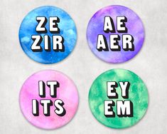 three buttons with the words she they, she they and she they on them in different colors