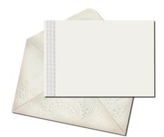 two envelopes with white paper and lace on the front, one is folded in half