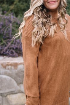 cozy up to this brushed thermal waffle knit. it has long fitted sleeves and then the rest is loose and flowy, just how we like it. split high low hem. it is so soft and long enough to throw on with your favorite pair of leggings. riley is 5'8" and wearing a 1XL. fits true to size for an oversized fit. 1XL measurements: 31.5" length, 53" bust. Cozy Waffle Knit Sweater For Loungewear, Long Sleeve Waffle Knit Sweater, Solid Waffle Knit Long Sleeve Sweater, Cozy Brown Waffle Knit Sweater, Long Sleeve Waffle Knit Sweater For Fall, Fall Waffle Knit Long Sleeve Sweater, Textured Knit Tops For Fall Loungewear, Waffle Knit Long Sleeve Sweater For Fall, Comfy Brown Tops For Loungewear